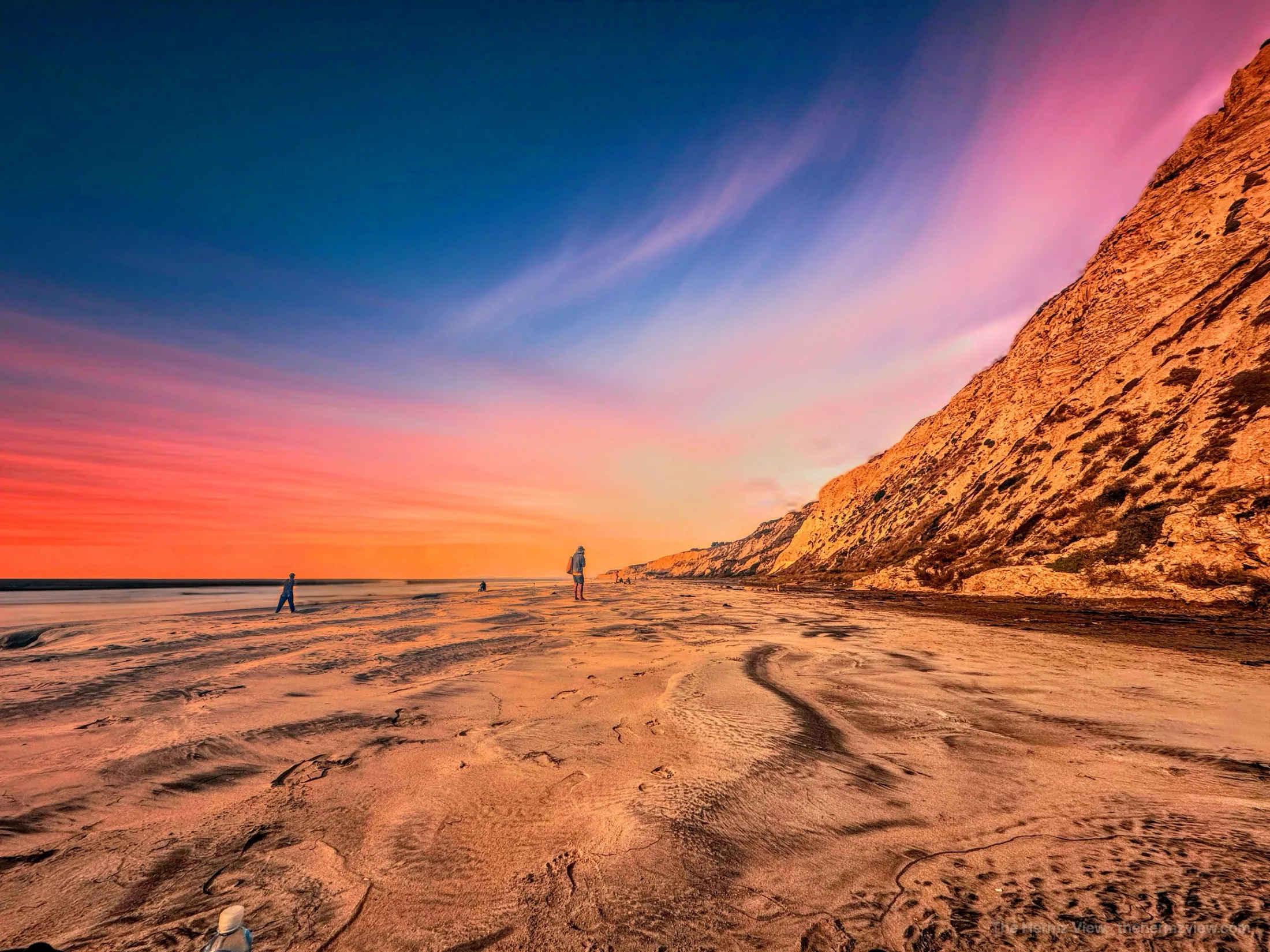 Tide swirling below a cliffside overlook