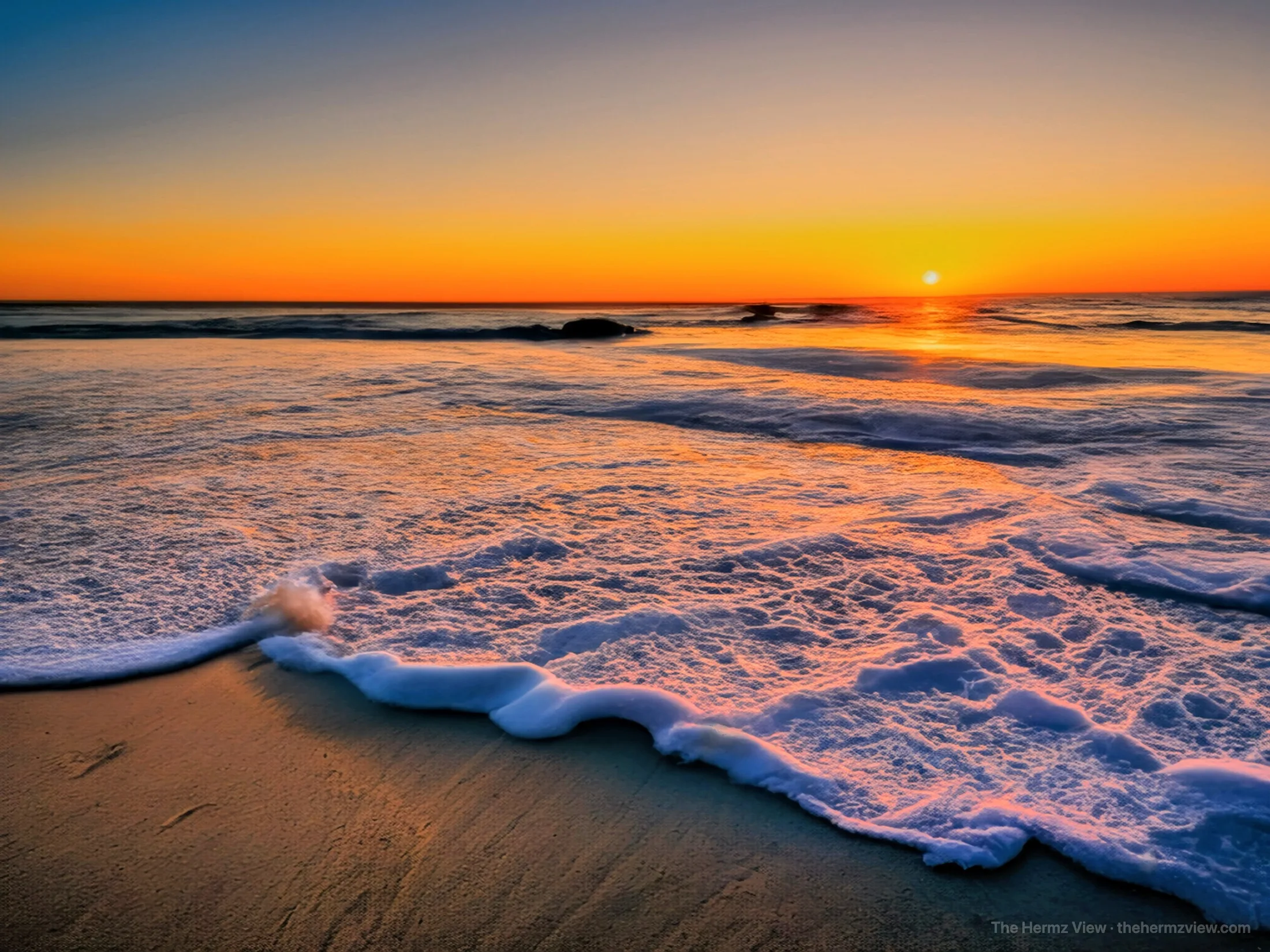 Final light spreading across ocean foam