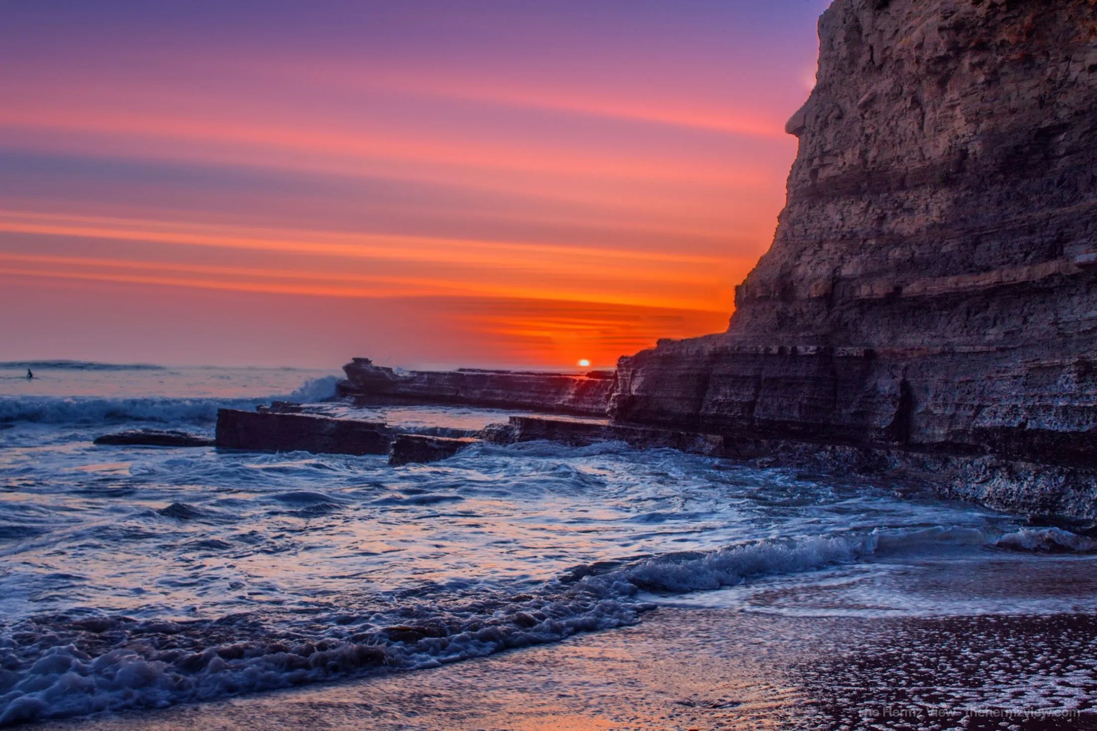 Sea cliffs bathed in warm sunset light